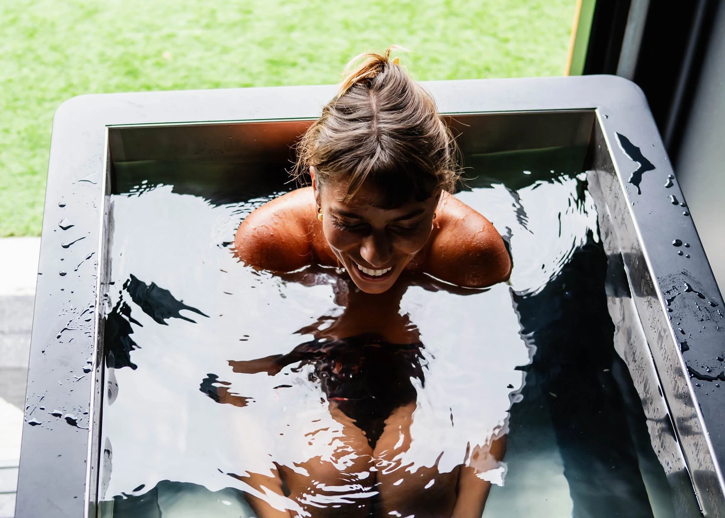 Cold plunge tub in daylight at the Club House ENC recovery studio in Encinitas